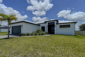 1227 NW 40th Pl in Cape Coral, FL - Building Photo - Building Photo
