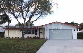 4317 Honeysuckle Ave, Unit 2915 in Palm Beach Gardens, FL - Building Photo