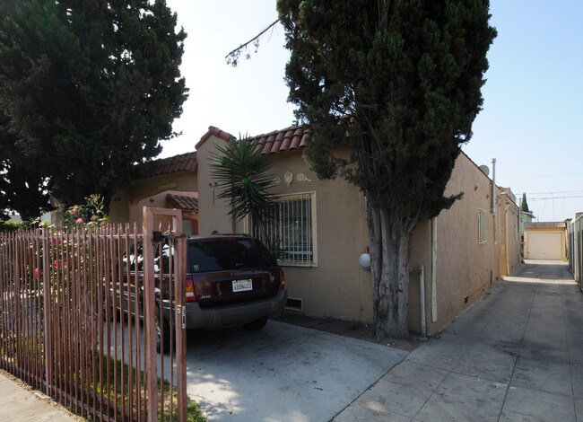 124-128 1/2 E. 74th St. in Los Angeles, CA - Building Photo - Building Photo