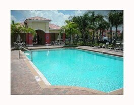 2928 Hidden Hills Rd, Unit 1403 in West Palm Beach, FL - Building Photo