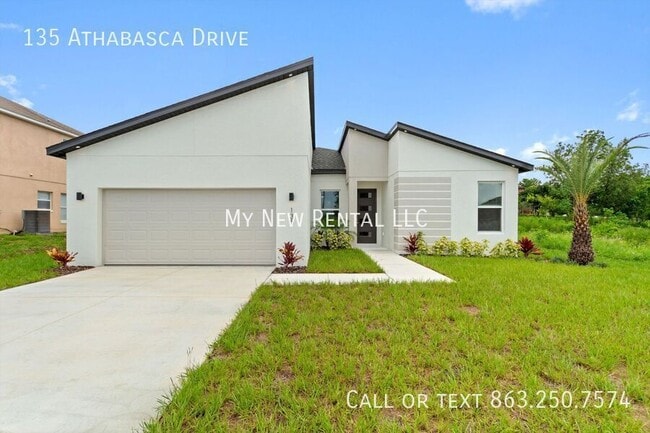 135 Athabasca Dr in Poinciana, FL - Building Photo - Building Photo