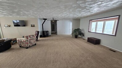 24 Spring St. Unit A in Phoenix, NY - Building Photo - Building Photo