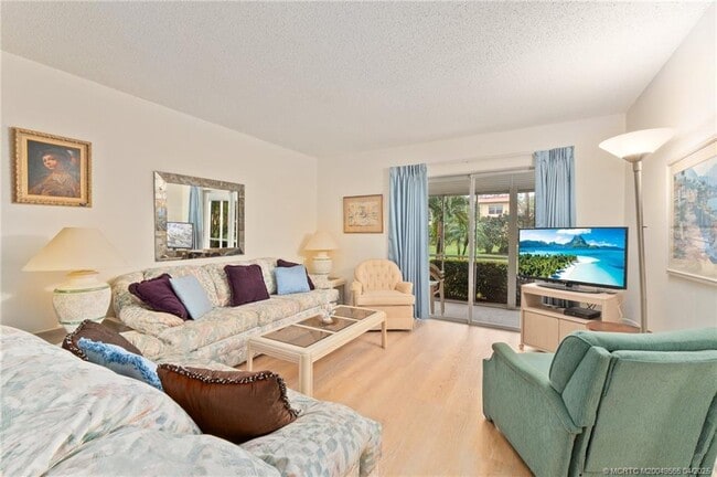 property at 1931 SW Palm City Rd