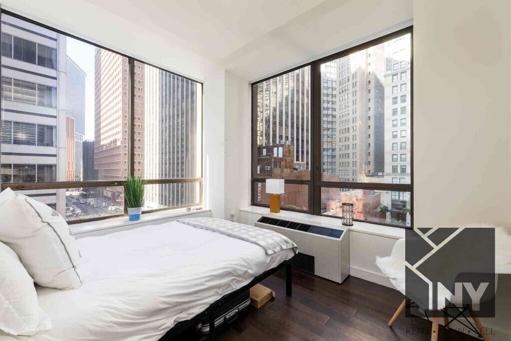 99 Wall St-Unit -2101 in New York, NY - Building Photo