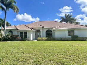 4898 SW Lake Grove Cir in Palm City, FL - Building Photo - Building Photo