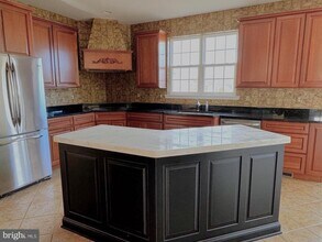 8209 Copperleaf Ct in Owings, MD - Foto de edificio - Building Photo