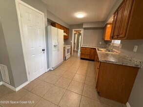 1295 Country Club Blvd in Titusville, FL - Building Photo - Building Photo