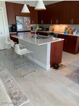 5717 Lago Villaggio Way in Naples, FL - Foto de edificio - Building Photo