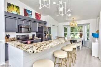 21340 Lancaster Run, Unit 1327 in Estero, FL - Foto de edificio - Building Photo