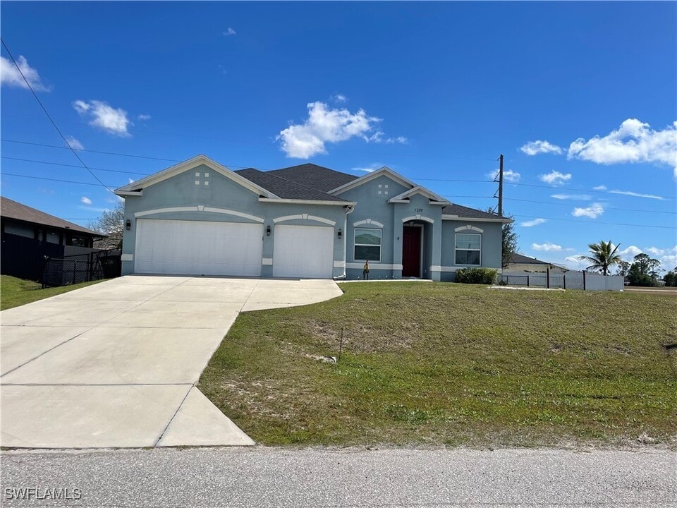 1239 NW 24th Pl in Cape Coral, FL - Building Photo