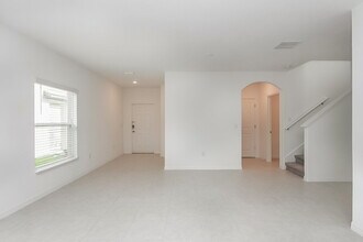 7340 Spring Snowflake Ave in Palm River-Clair Mel, FL - Building Photo - Building Photo