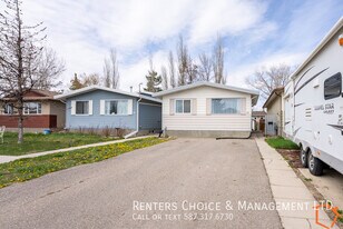 2 Bedroom Main Floor, Assigned Parking, Utilities Included in Lethbridge, AB - Building Photo