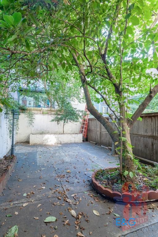 property at 230 E 32nd St