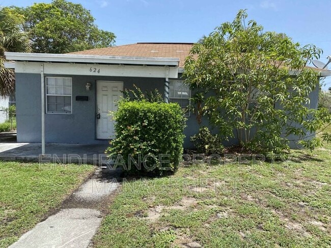 property at 624 W 2nd St