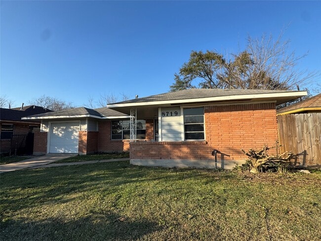 property at 8719 Tilgham St