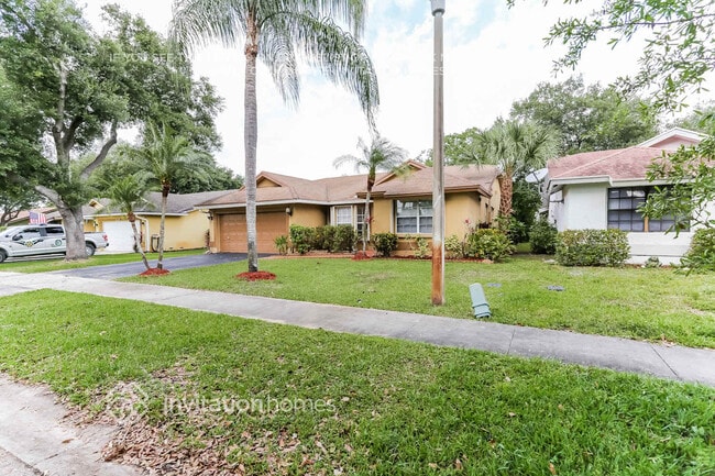 property at 9575 NW 25th Ct