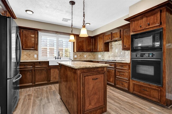 property at 19810 Bambiwoods Ct