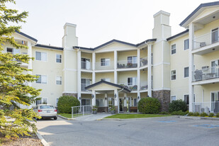 72 Quigley Dr in Cochrane, AB - Building Photo
