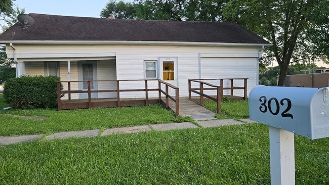 property at 302 E 3rd St