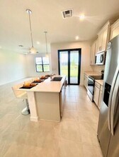 14043 SW Thorens Dr in Port St. Lucie, FL - Building Photo - Building Photo