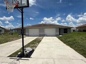 1135 Harry Ave S in Lehigh Acres, FL - Building Photo - Building Photo