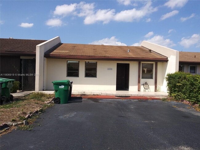 property at 13759 SW 49th St
