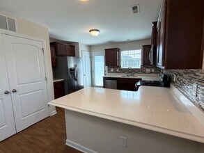 7501 Oliver Park Dr in Whitsett, NC - Building Photo - Building Photo