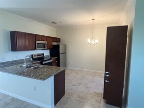 8463 Dinnano St in Port Charlotte, FL - Building Photo - Building Photo