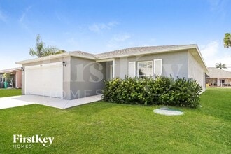 2568 SW Deckard St in Port St. Lucie, FL - Building Photo - Building Photo