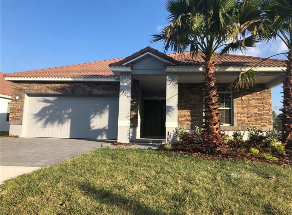 1408 Oak Marsh St in Davenport, FL - Building Photo