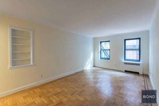 property at 124 E 24th St