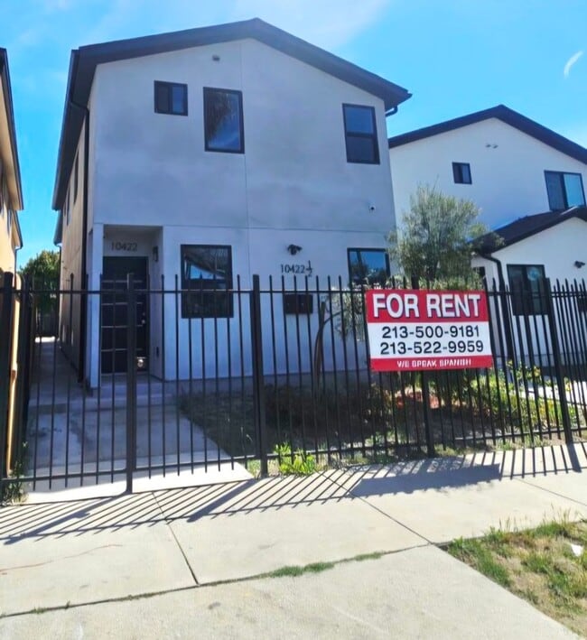 property at 10422 1/2-10422 1/2 Graham Ave