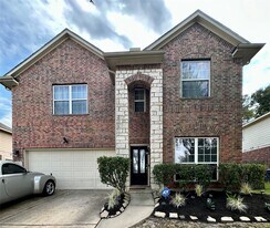 9102 Rolling Rapids Rd in Humble, TX - Building Photo