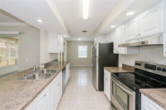 1202 MacFarlane Ave in Spring Hill, FL - Building Photo - Building Photo