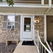 10607 W Dartmouth Ave in Lakewood, CO - Foto de edificio - Building Photo