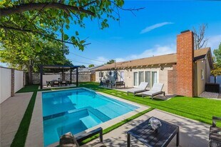 23010 Hartland St in Los Angeles, CA - Building Photo