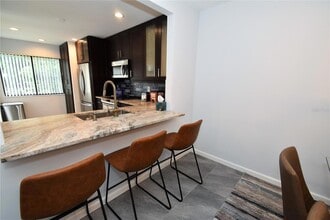 1508 Pelican Cove Rd, Unit GR233 in Sarasota, FL - Building Photo - Building Photo