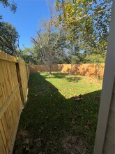 204 Booker T Washington St in Conroe, TX - Building Photo - Building Photo