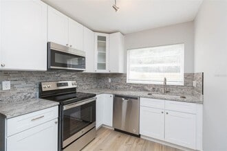 7518 New Jersey Ave-Unit -C in Hudson, FL - Building Photo - Building Photo