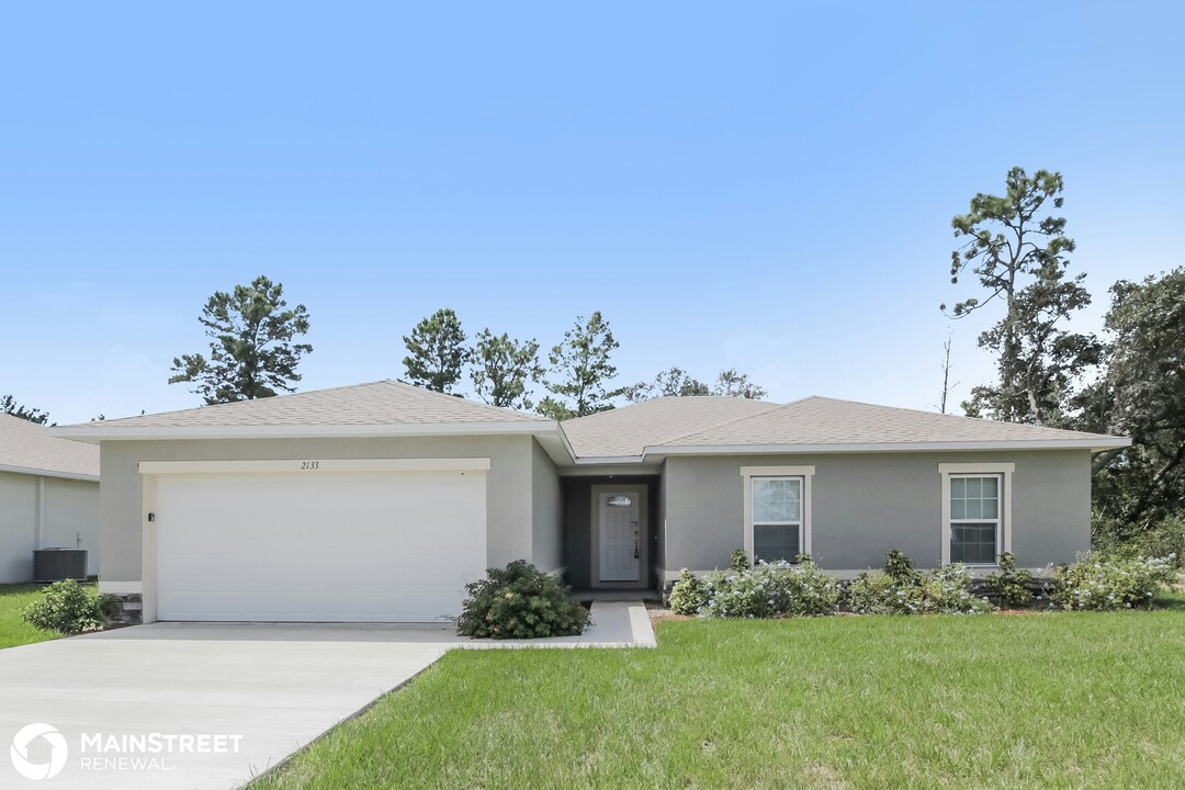 2133 Hibiscus Way in Kissimmee, FL - Building Photo