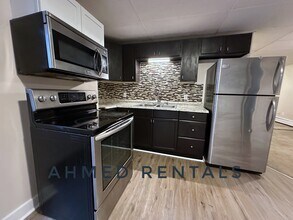 37 Tate St, Unit 1 in Portland, ME - Foto de edificio - Building Photo