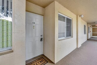 9599 Weldon Cir in Tamarac, FL - Building Photo - Building Photo