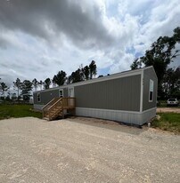614 CR 5253 in Cleveland, TX - Building Photo