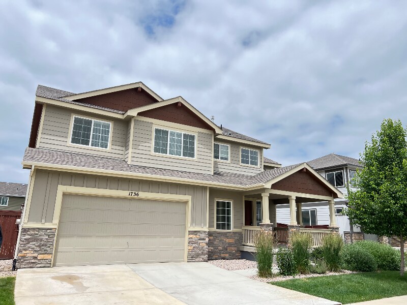 1736 Country Sun Dr in Windsor, CO - Building Photo