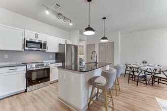 Vine + Vail Townhomes and Apartments in Grapevine, TX - Building Photo - Building Photo