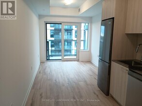 7439 Kingston Rd in Toronto, ON - Building Photo - Building Photo