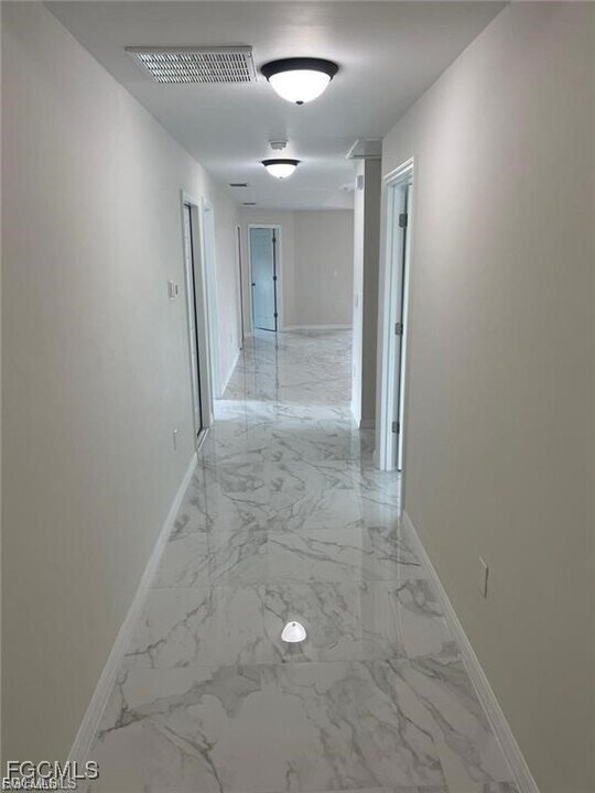 399 Carrillon Ave S in Lehigh Acres, FL - Building Photo