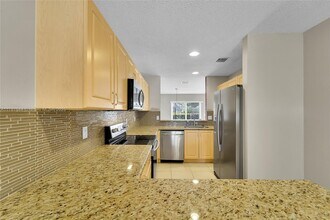 9840 NW 19th Pl in Sunrise, FL - Building Photo - Building Photo