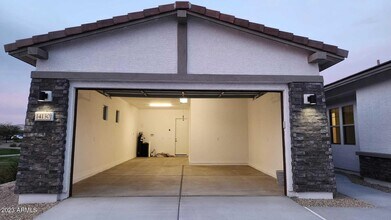 14130 W El Cortez Pl in Sun City West, AZ - Building Photo - Building Photo