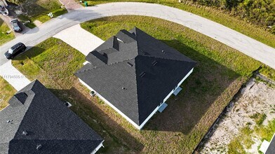 8448 Dinnano St in Port Charlotte, FL - Building Photo - Building Photo